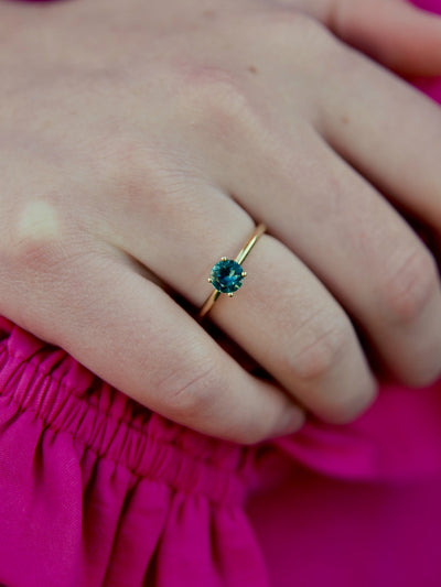 Ocean blue sapphire and gold ring