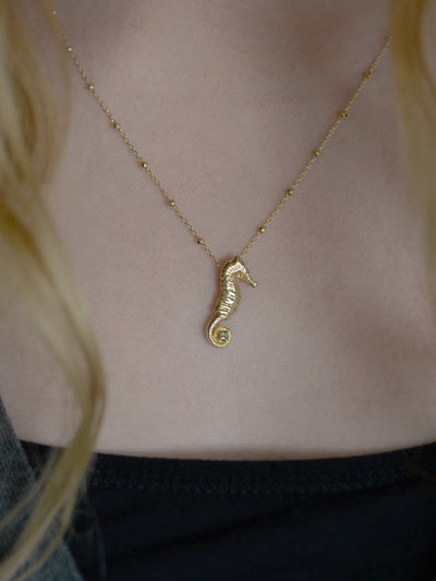 Seahorse Necklace in 14k gold set with tourmaline